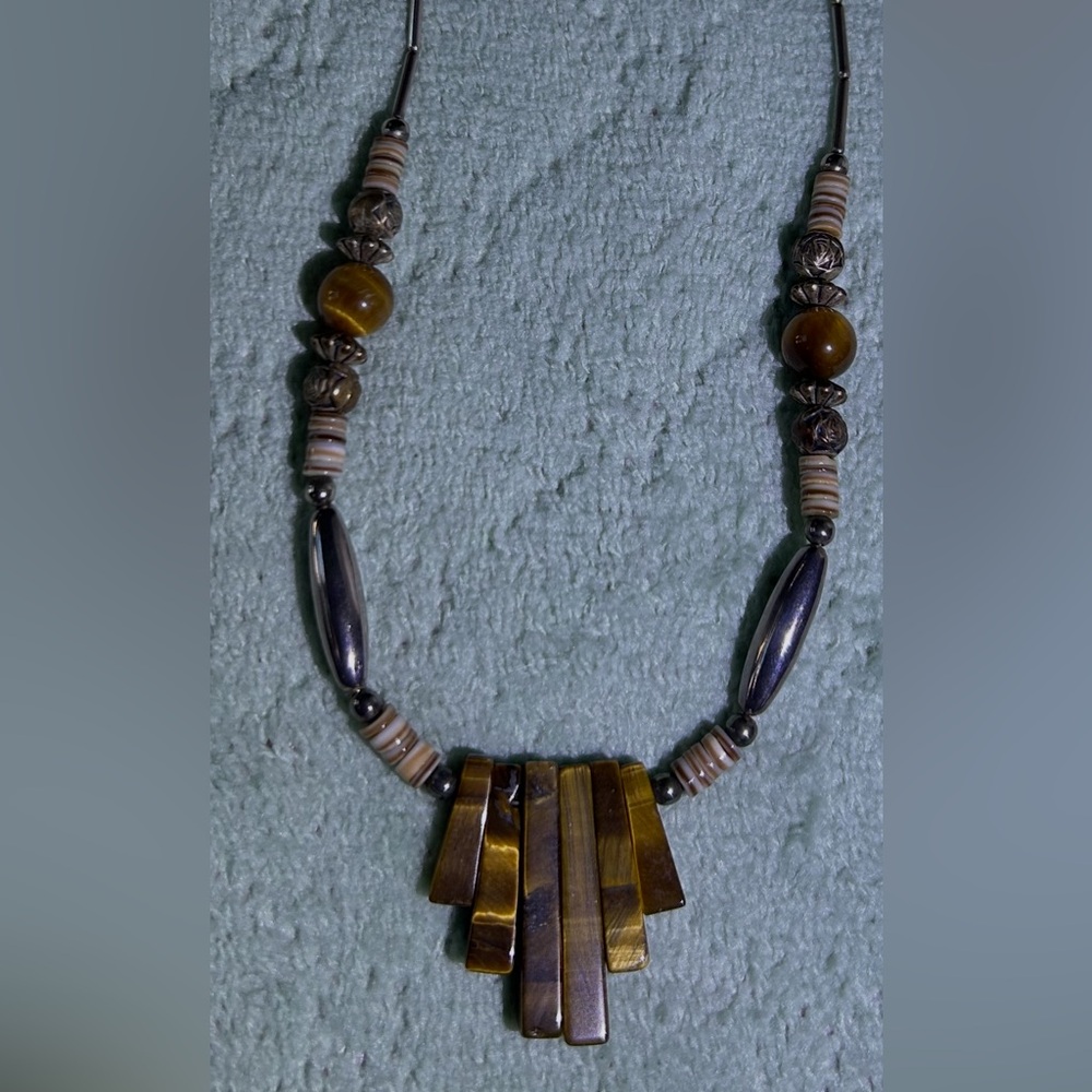 Elegant Brown and Gold Necklace with a twist magnetic closure.  16 1/2 “ long